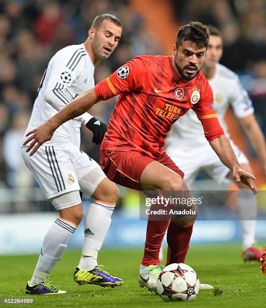 Galatasaray's Gokhan Zan vies for the ball during the UEFA Champions League football match between Real Madrid vs Galatasaray at the Santiago...