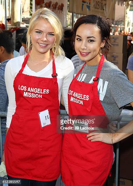 Kelli Goss and Savannah Jayde attend the LA Mission Thanksgiving For The Homeless event at Los Angeles Mission on November 27, 2013 in Los Angeles,...