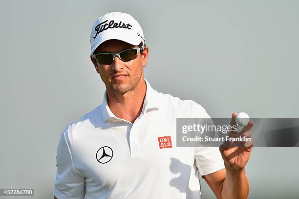 Adam Scott of Australia acknowledges the crowd during the first round of The 143rd Open Championship at Royal Liverpool on July 17, 2014 in Hoylake,...