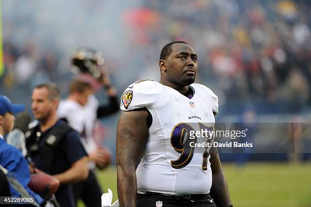 Arthur Jones of the Baltimore Ravens warms up during a game against the Chicago Bears on November 17, 2013 at Soldier Field in Chicago, Illinois.