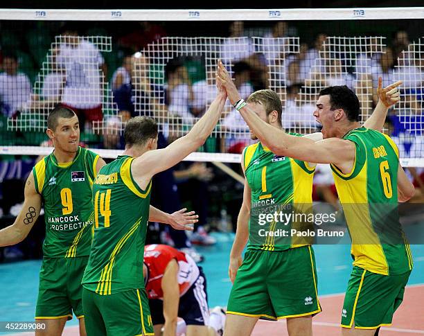 Edgar Thomas with his teammates of Australia celebrate during the FIVB World League Final Six match between United States and Australia at Mandela...