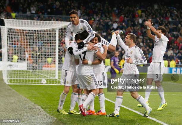 The Real Madrid player´s celebrate after scoring during the UEFA Champions League Group B match between Real Madrid and Galatasaray AS at Estadio...
