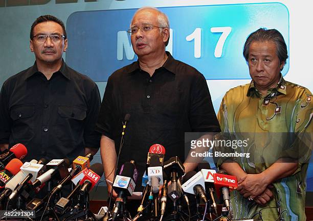 Hishammuddin Hussein, Malaysia's defense minister, from left, Najib Razak, Malaysia's prime minister, and Anifah Man, Malaysia's foreign affairs...