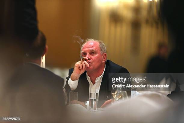 Uli Hoeness, President of Bayern Muenchen enjoys a cigar during the Champions Dinner at RitzCarlon Hotel Moscow after winning UEFA Champions League...