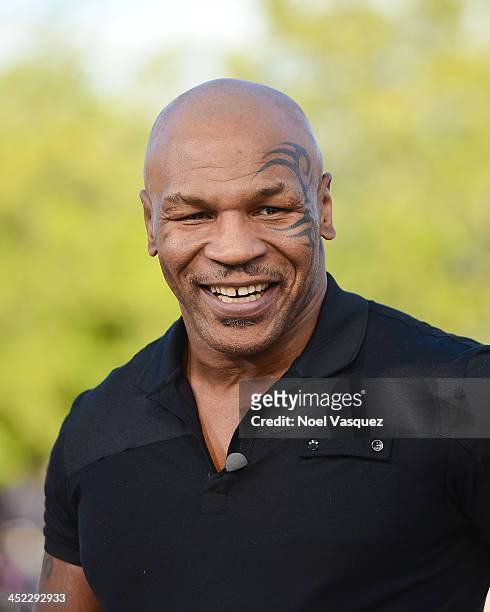 Mike Tyson visits "Extra" at Universal Studios Hollywood on November 27, 2013 in Universal City, California.