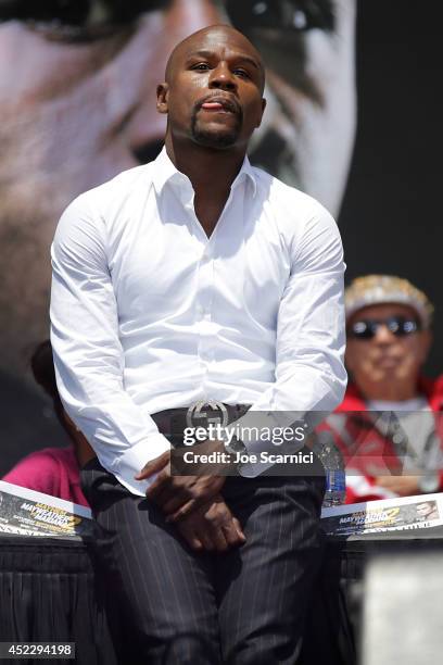 Floyd Mayweather Jr waits on stage during a news conference at Pershing Square in Downtown Los Angeles on July 17, 2014 in Los Angeles, California.