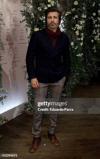 Jesus Olmedo attends 'La Cristalizacion De La Rosa Blanca' party photocall at Adolfo Dominguez store on November 27, 2013 in Madrid, Spain.