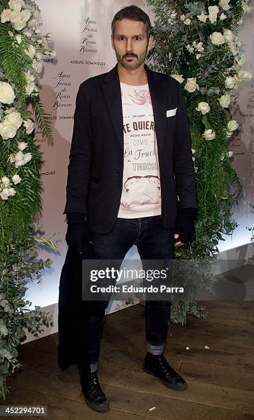 Ton Pernas attends 'La Cristalizacion De La Rosa Blanca' party photocall at Adolfo Dominguez store on November 27, 2013 in Madrid, Spain.