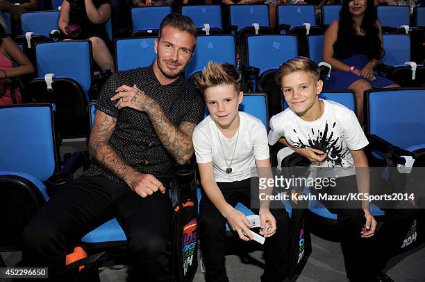 Former soccer player David Beckham, Cruz David Beckham and Romeo James Beckham attend Nickelodeon Kids' Choice Sports Awards 2014 at UCLA's Pauley...