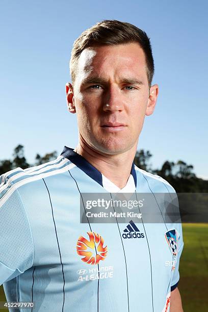 Shane Smeltz poses as he unveils the new Sydney FC jersey during a Sydney FC A-League training session at Macquarie Uni on July 18, 2014 in Sydney,...