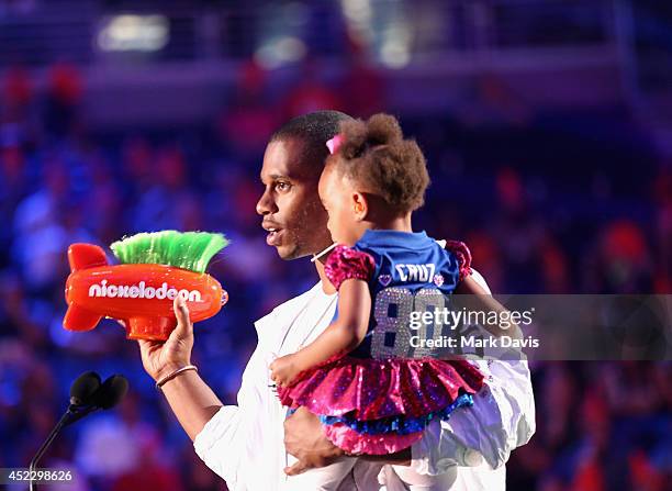 Player Victor Cruz and daughter Kennedy Cruz speak onstage during Nickelodeon Kids' Choice Sports Awards 2014 at UCLA's Pauley Pavilion on July 17,...