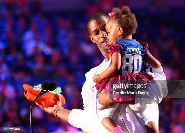 Player Victor Cruz and daughter Kennedy Cruz speak onstage during Nickelodeon Kids' Choice Sports Awards 2014 at UCLA's Pauley Pavilion on July 17,...