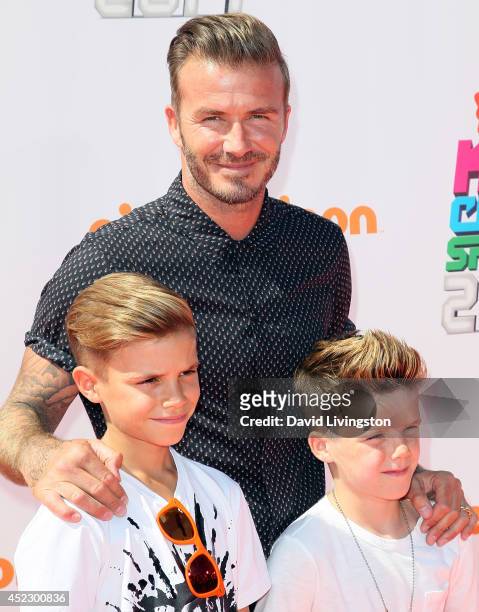 Former professional soccer player David Beckham and children Romeo James Beckham and Cruz David Beckham attend the Nickelodeon Kids' Choice Sports...