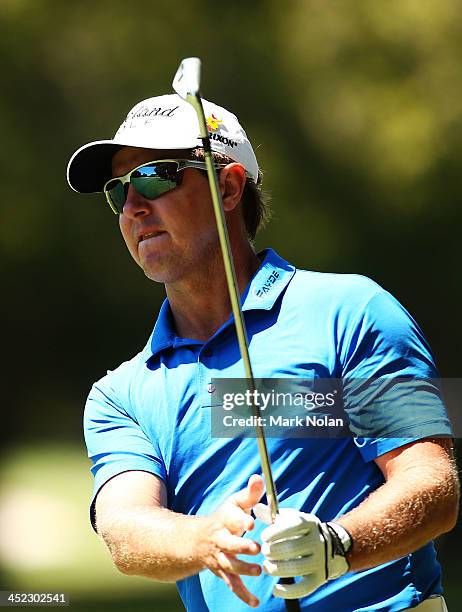 Scott Laycock of Australia plays an approach shot during day one of the 2013 Australian Open at Royal Sydney Golf Club on November 28, 2013 in...