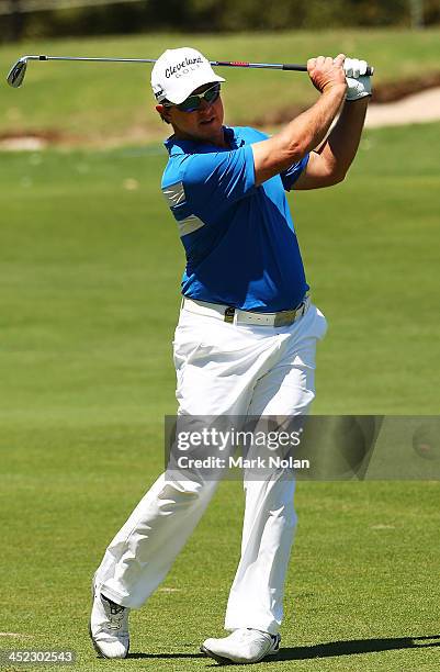 Scott Laycock of Australia plays an approach shot during day one of the 2013 Australian Open at Royal Sydney Golf Club on November 28, 2013 in...