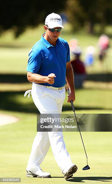 Scott Laycock of Australia acelebrates after a putt during day one of the 2013 Australian Open at Royal Sydney Golf Club on November 28, 2013 in...