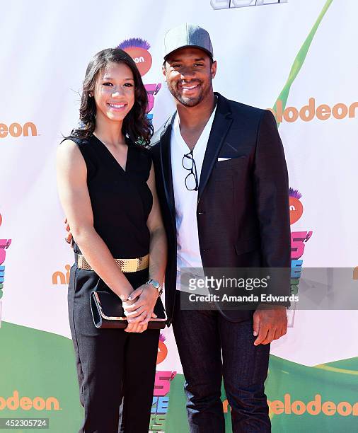 Player Russell Wilson and his sister Anna Wilson arrive at the Nickelodeon Kids' Choice Sports Awards 2014 on July 17, 2014 in Los Angeles,...