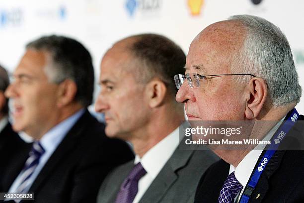 Joe Hockey, Australian Treasurer, John Rice, CEO GE Global Growth and Operations and Sam Walsh, CEO Rio Tinto attend a press conference during the...