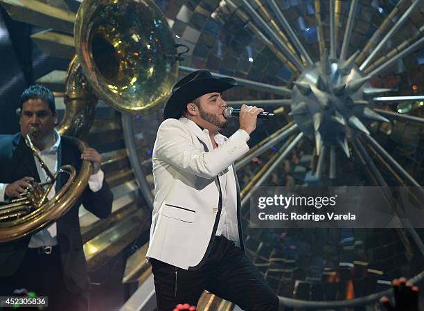 Gerardo Ortiz performs onstage during the Premios Juventud 2014 at The BankUnited Center on July 17, 2014 in Coral Gables, Florida.