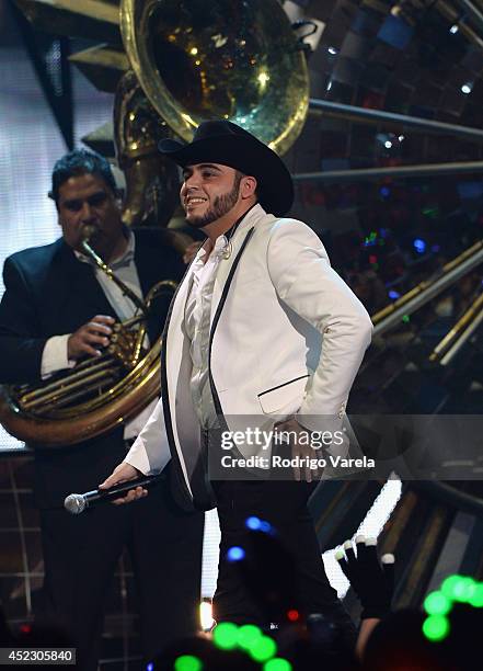 Gerardo Ortiz performs onstage during the Premios Juventud 2014 at The BankUnited Center on July 17, 2014 in Coral Gables, Florida.