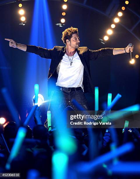 David Bisbal performs onstage during the Premios Juventud 2014 at The BankUnited Center on July 17, 2014 in Coral Gables, Florida.