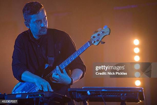 Simon Green aka Bonobo performs on stage at Brixton Academy on November 23, 2013 in London, England.