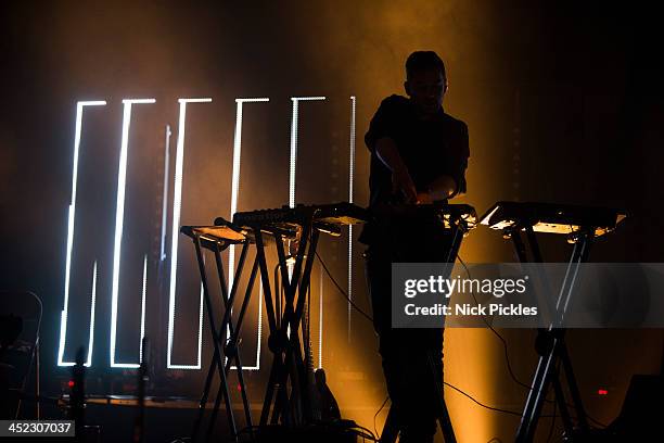 Simon Green aka Bonobo performs on stage at Brixton Academy on November 23, 2013 in London, England.