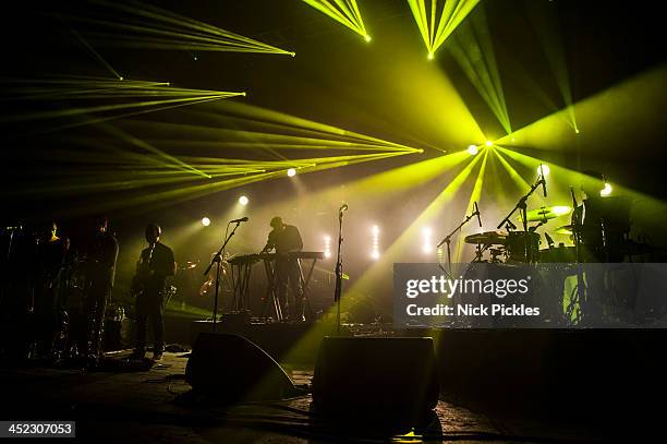 Simon Green aka Bonobo performs on stage at Brixton Academy on November 23, 2013 in London, England.