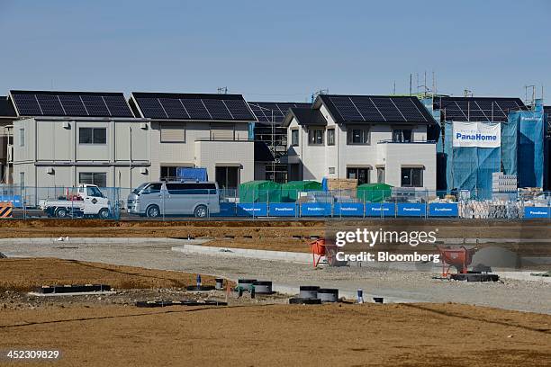 New houses stand under construction at Fujisawa Sustainable Smart Town , developed by Panasonic Corp., in Fujisawa, Kanagawa Prefecture, Japan, on...