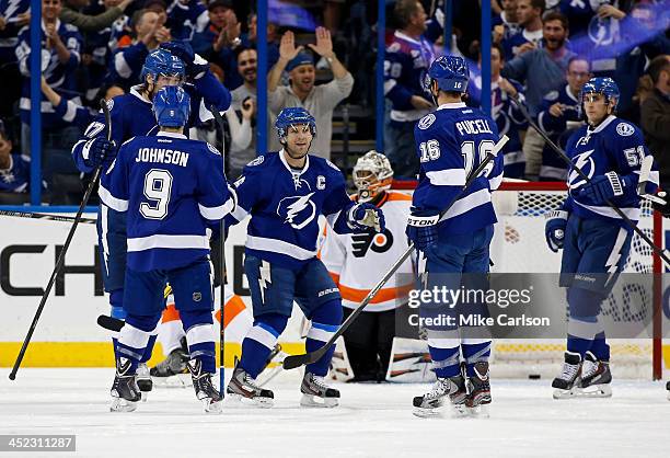Members of the Tampa Bay Lightning Victor Hedman, Tyler Johnson, Martin St. Louis, Teddy Purcell and Valtteri Filppula celebrate a goal in front of...