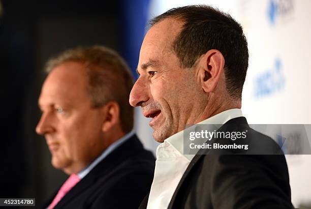 Andrew Bassat, chief executive officer of Seek Ltd., right, speaks as Rod Drury, chief executive officer of Xero Ltd., looks on during a news...