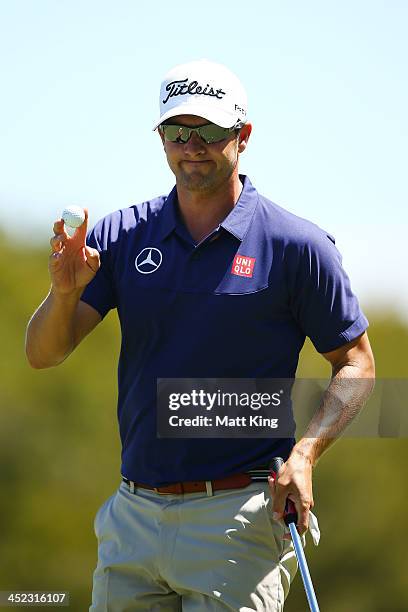 Adam Scott of Australia acknowledges the crowd during day one of the 2013 Australian Open at Royal Sydney Golf Club on November 28, 2013 in Sydney,...