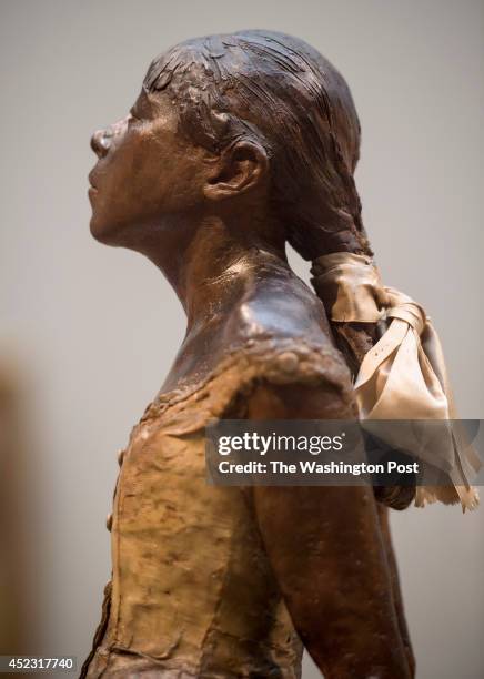 The Little Dancer," a sculpture by French artist Edgar Degas, is on display at the National Gallery of Art's East Building, seen Wednesday, July 16,...