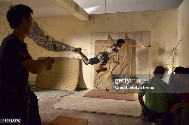 Stuntman practicing a jump on the Hong Kong film set of Rigor Mortis , a horror film about vampires. The film is Juno Mak's directorial debut and is...