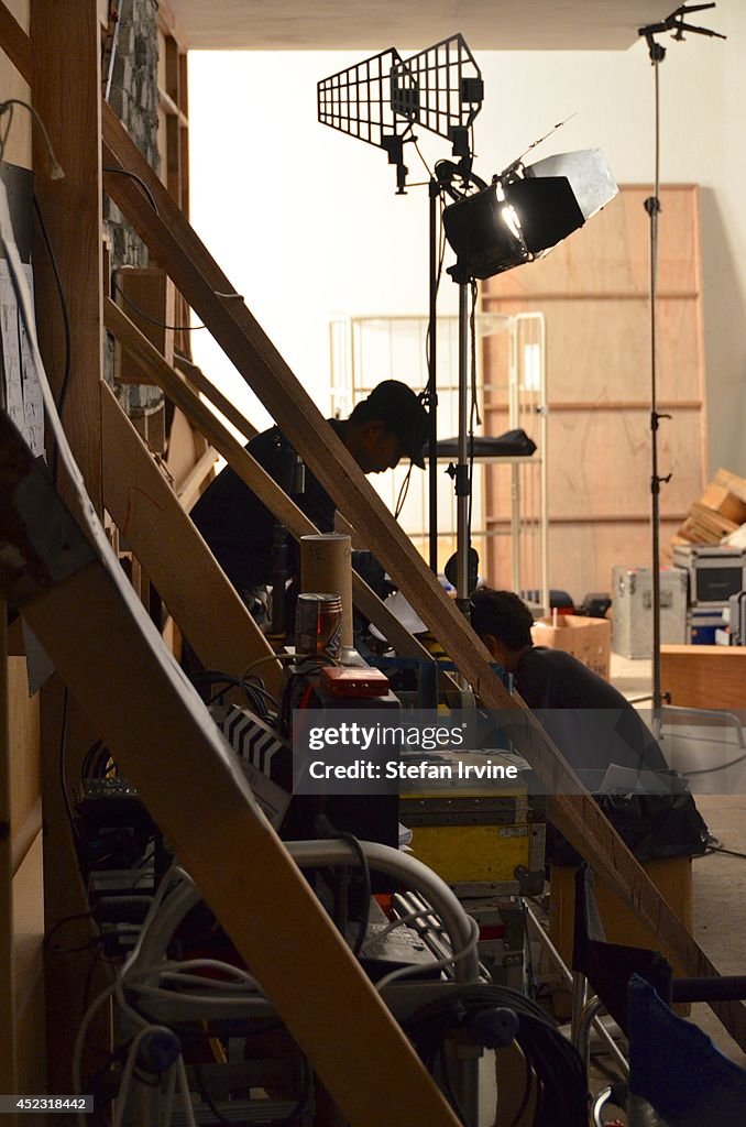 Part of the lighting set-up and set construction on the Hong...