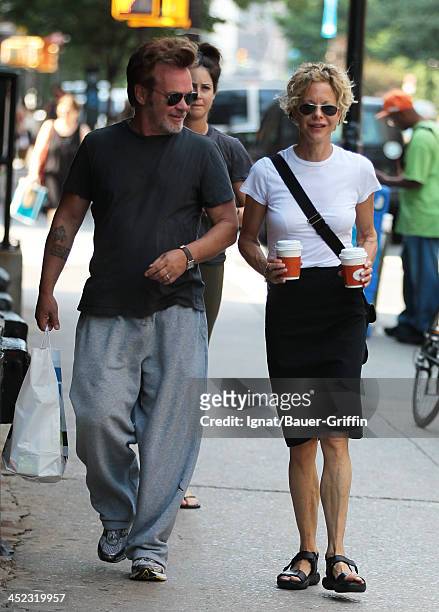 June 24: John Mellencamp and Meg Ryan are seen on June 24, 2013 in New York City.