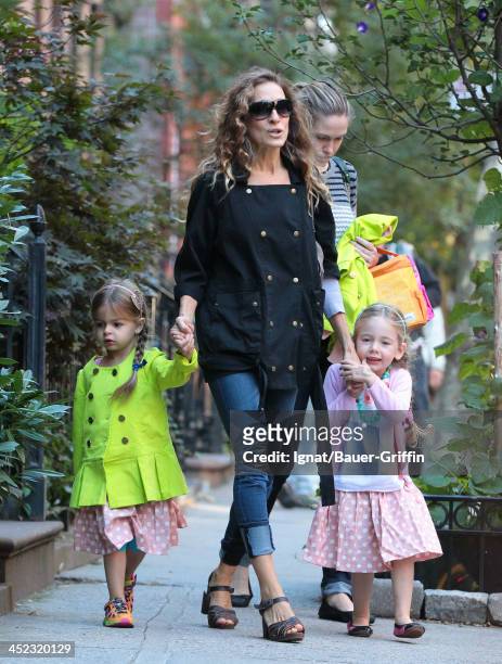 September 23: Sarah Jessica Parker walk with daughters Marion Loretta Elwell Broderick and Tabitha Hodge Broderick in the West Village on September...