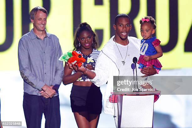 Victor Cruz and daughter Kennedy Cruz speak onstage at Nickelodeon Kids' Choice Sports Awards 2014 at Pauley Pavilion on July 17, 2014 in Los...