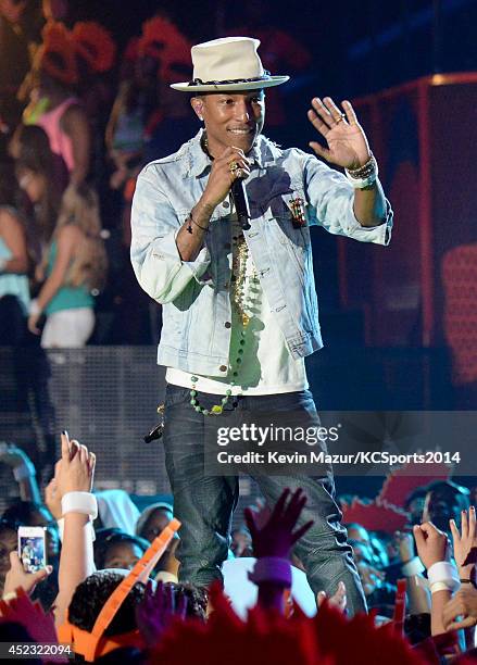 Recording artist Pharrell Williams performs at Nickelodeon Kids' Choice Sports Awards 2014 at UCLA's Pauley Pavilion on July 17, 2014 in Los Angeles,...