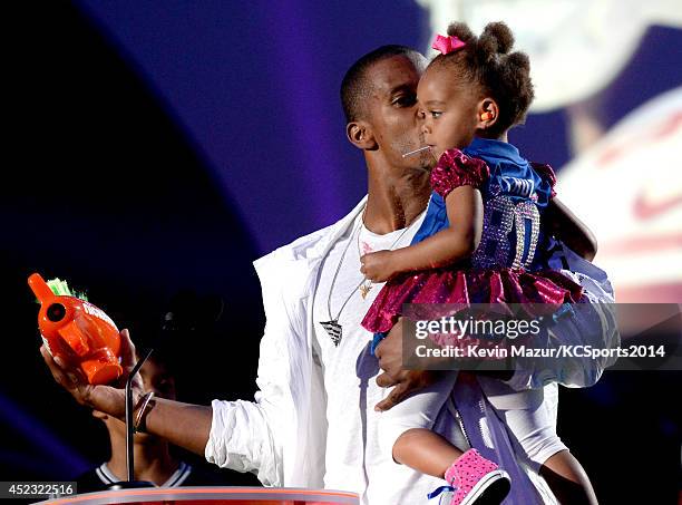 Player Victor Cruz and Kennedy Cruz speak onstage at the Nickelodeon Kids' Choice Sports Awards 2014 at UCLA's Pauley Pavilion on July 17, 2014 in...