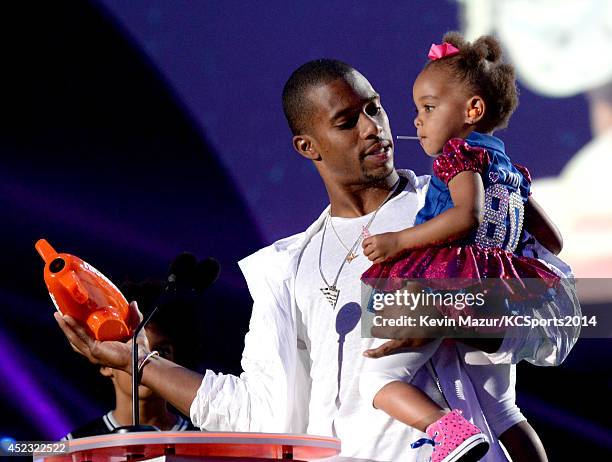 Player Victor Cruz and Kennedy Cruz speak onstage at the Nickelodeon Kids' Choice Sports Awards 2014 at UCLA's Pauley Pavilion on July 17, 2014 in...