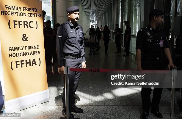 Malaysia Airlines Security personel stand guard near Kuala Lumpur International Airport on July 18, 2014 in Kuala Lumpur, Malaysia. Malaysia Airlines...