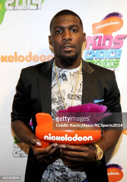 Player Dez Bryant wins award at the Nickelodeon Kids' Choice Sports Awards 2014 at UCLA's Pauley Pavilion on July 17, 2014 in Los Angeles, California.