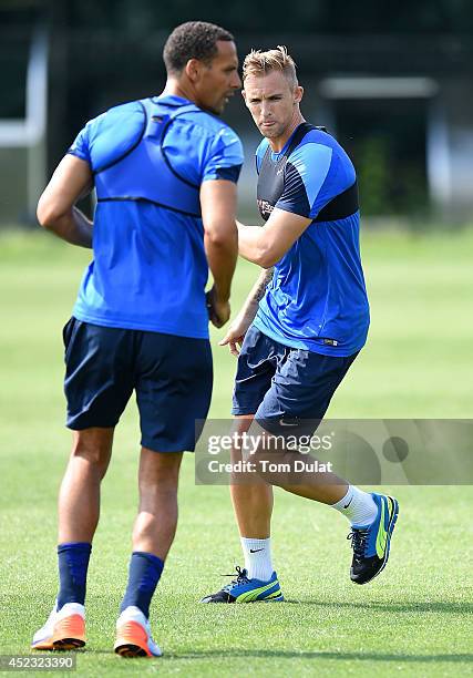 Jack Collison warms up during a Queens Park Rangers training session on July 18, 2014 in Harlington, England.