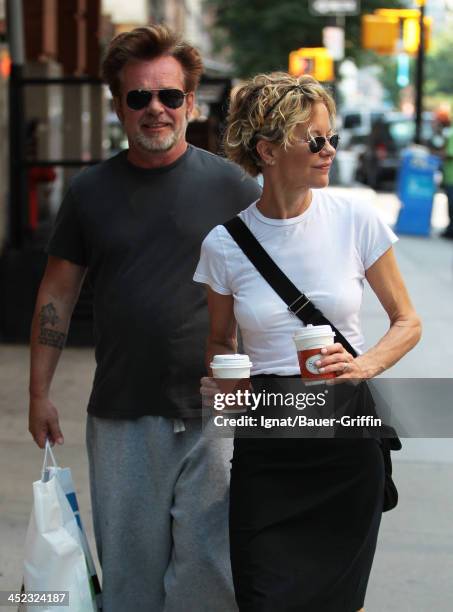 June 24: John Mellencamp and Meg Ryan are seen on June 24, 2013 in New York City.