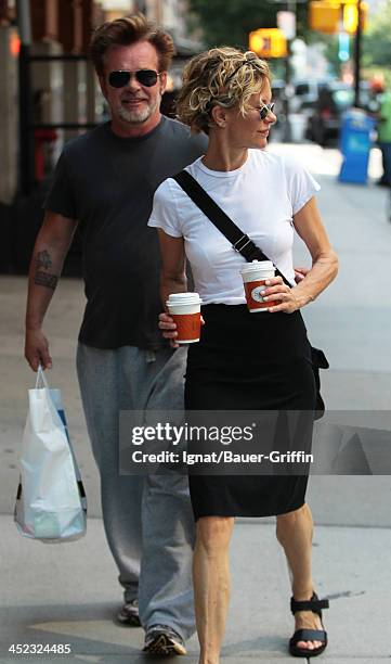 June 24: John Mellencamp and Meg Ryan are seen on June 24, 2013 in New York City.