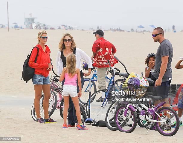 Heidi Klum and Martin Kirsten are seen taking her children, Leni Samuel and Johan Samuel to the beach on August 25, 2013 in Los Angeles, California.