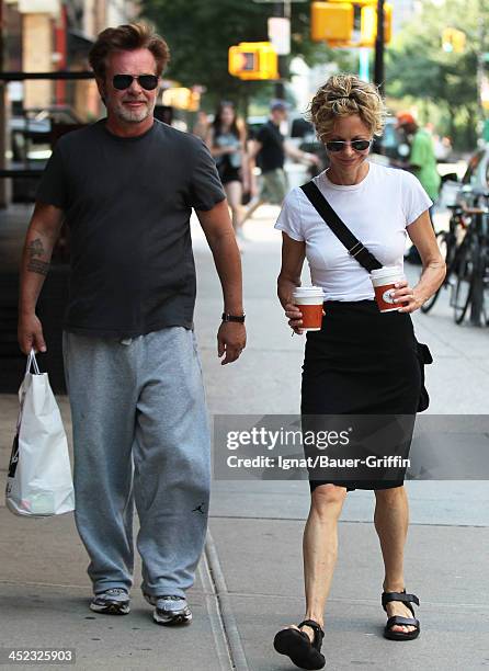 June 24: John Mellencamp and Meg Ryan are seen on June 24, 2013 in New York City.