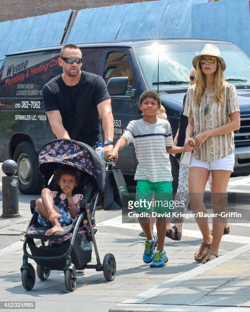 June 24: Sighting of Heidi Klum and Martin Kristen with Johan Samuel, Leni Samuel, Henry Samuel and Lou Samuel on June 24, 2013 in New York City.