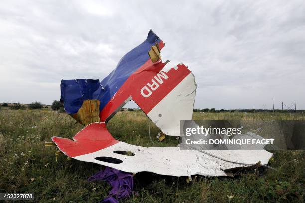 Piece of wreckage of the Malaysia Airlines flight MH17 is pictured on July 18, 2014 in Shaktarsk, the day after it crashed. Flight MH17 from...